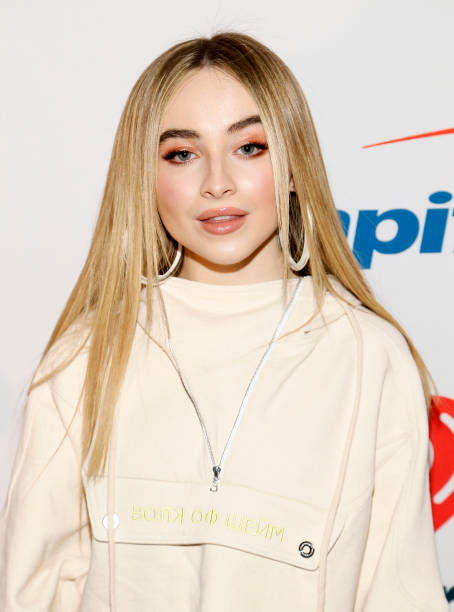 Sabrina Carpenter arrives at Hot 99.5's iHeartRadio Jingle Ball 2018 at Capital One Arena on December 10, 2018 in Washington, DC. (454×612)