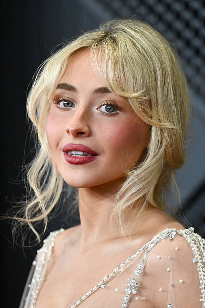 Sabrina Carpenter at the 68th GRAMMY Awards held at the Crypto.com Arena on February 01, 2026 in Los Angeles, California. — frame 43/48 (407×612)