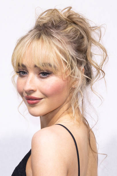 Sabrina Carpenter attends the Elie Saab Haute Couture Spring Summer 2023 show as part of Paris Fashion Week on January 25, 2023 in Paris, France. — frame 3/7 (408×612)