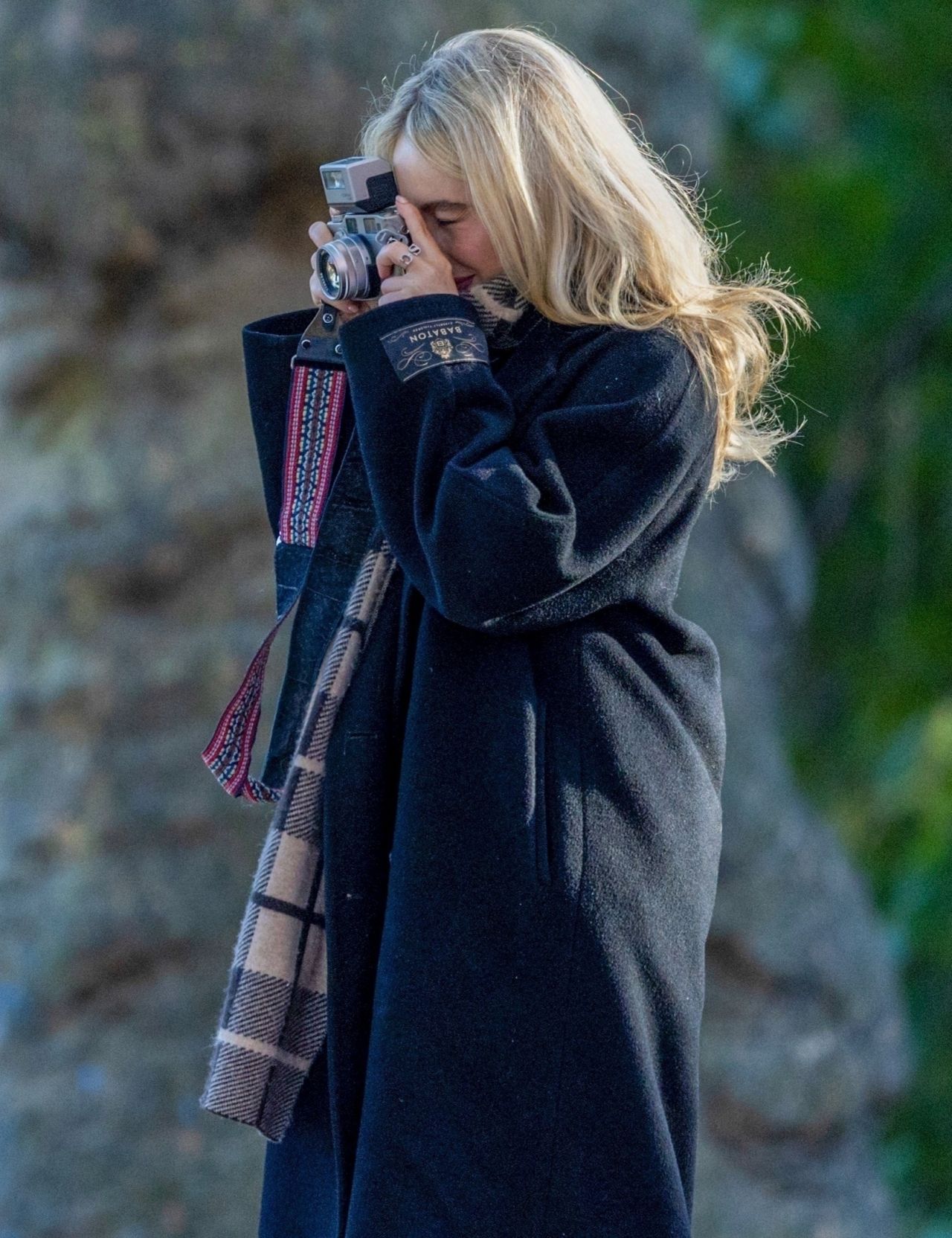 Sabrina Carpenter in Aritzia Coat and Plaid Scarf