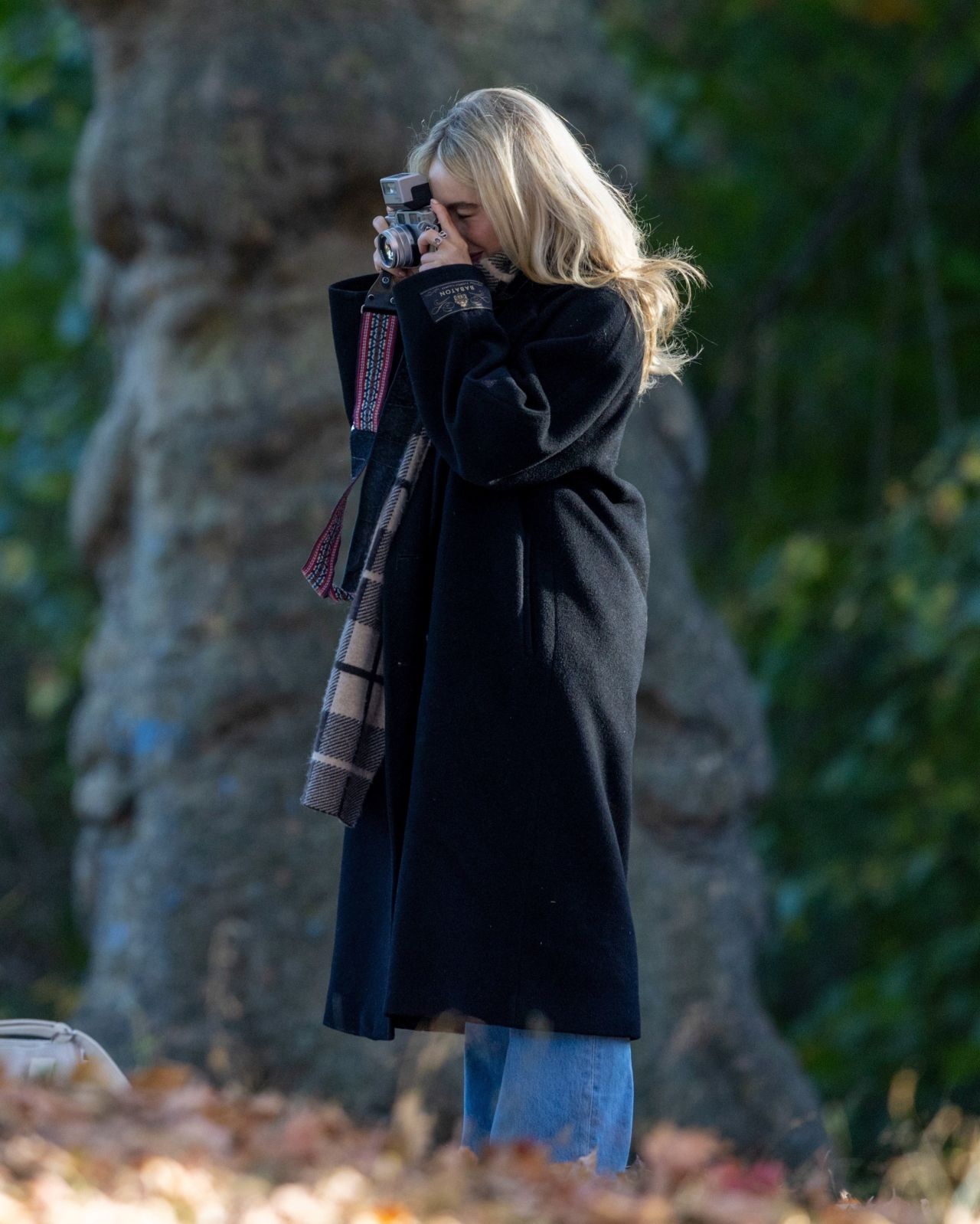 Sabrina Carpenter in Aritzia Coat and Plaid Scarf