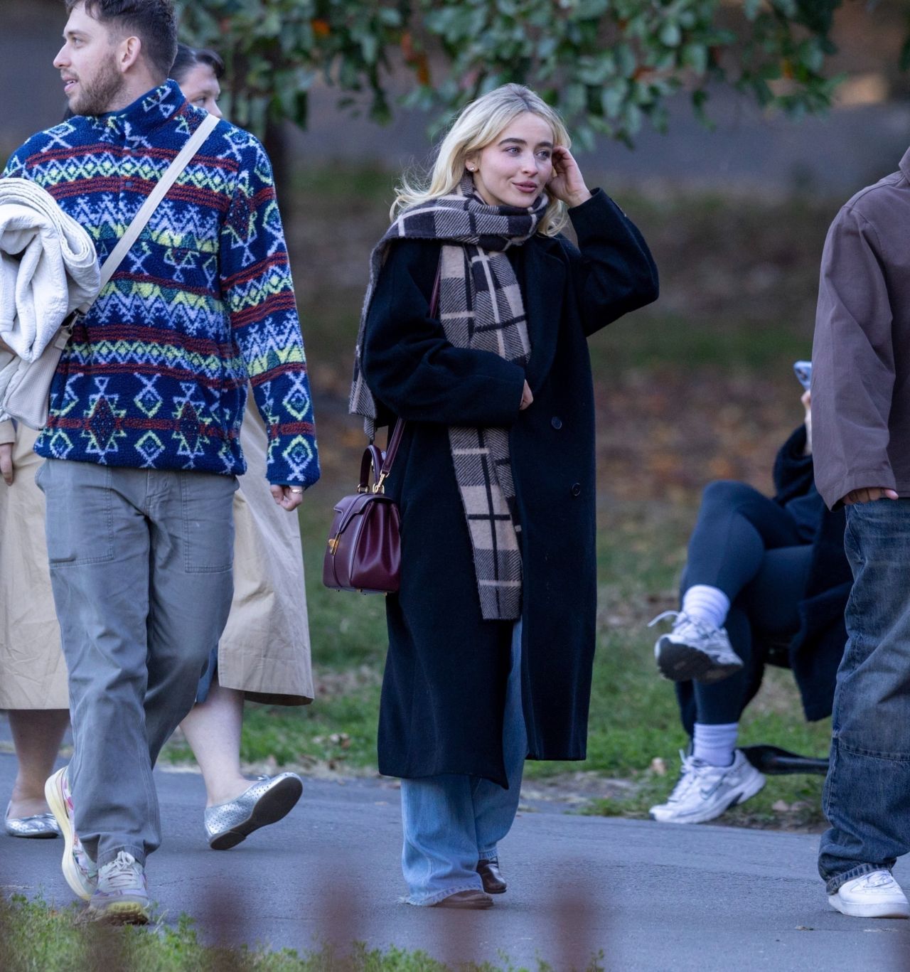 Sabrina Carpenter in Aritzia Coat and Plaid Scarf