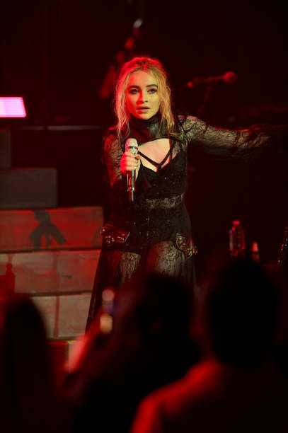 Sabrina Carpenter Performs on Stage During