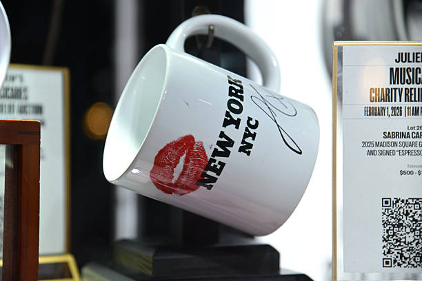 Shot of a mug used and signed by Sabrina Carpenter during a performances of her song "Espresso" displayed at MusiCares charity relief auction at Los Angeles Convention Center on January 29, 2026 in Los Angeles, California. (612×408)
