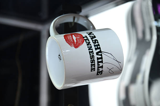 Shot of a mug used and signed by Sabrina Carpenter during a performances of her song "Espresso" displayed at MusiCares charity relief auction at Los Angeles Convention Center on January 29, 2026 in Los Angeles, California. (612×408)