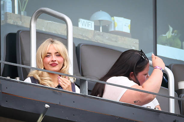 Singer, songwriter, and actress Sabrina Carpenter looks on during the FIFA World Cup 2026 Group E match between Ecuador and Germany at New York New Jersey Stadium on June 25, 2026 in East Rutherford, New Jersey. (612×408)